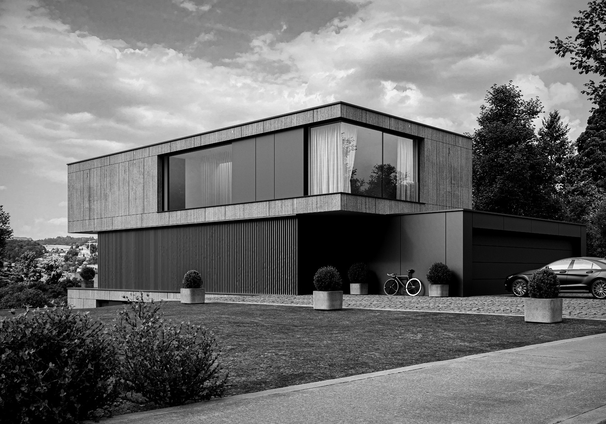 Strassenseite der Villa mit dunklem Sockel und Doppelgarage